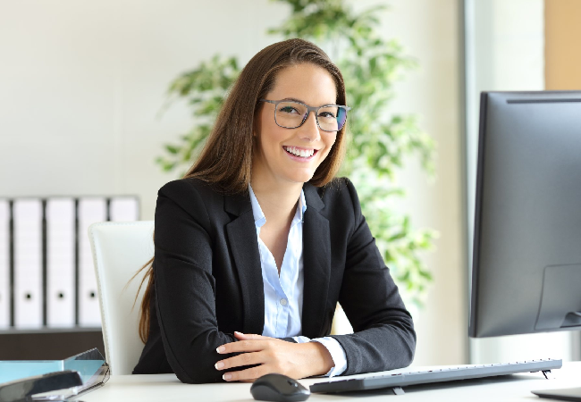 Professional lady posing for a pic in the office